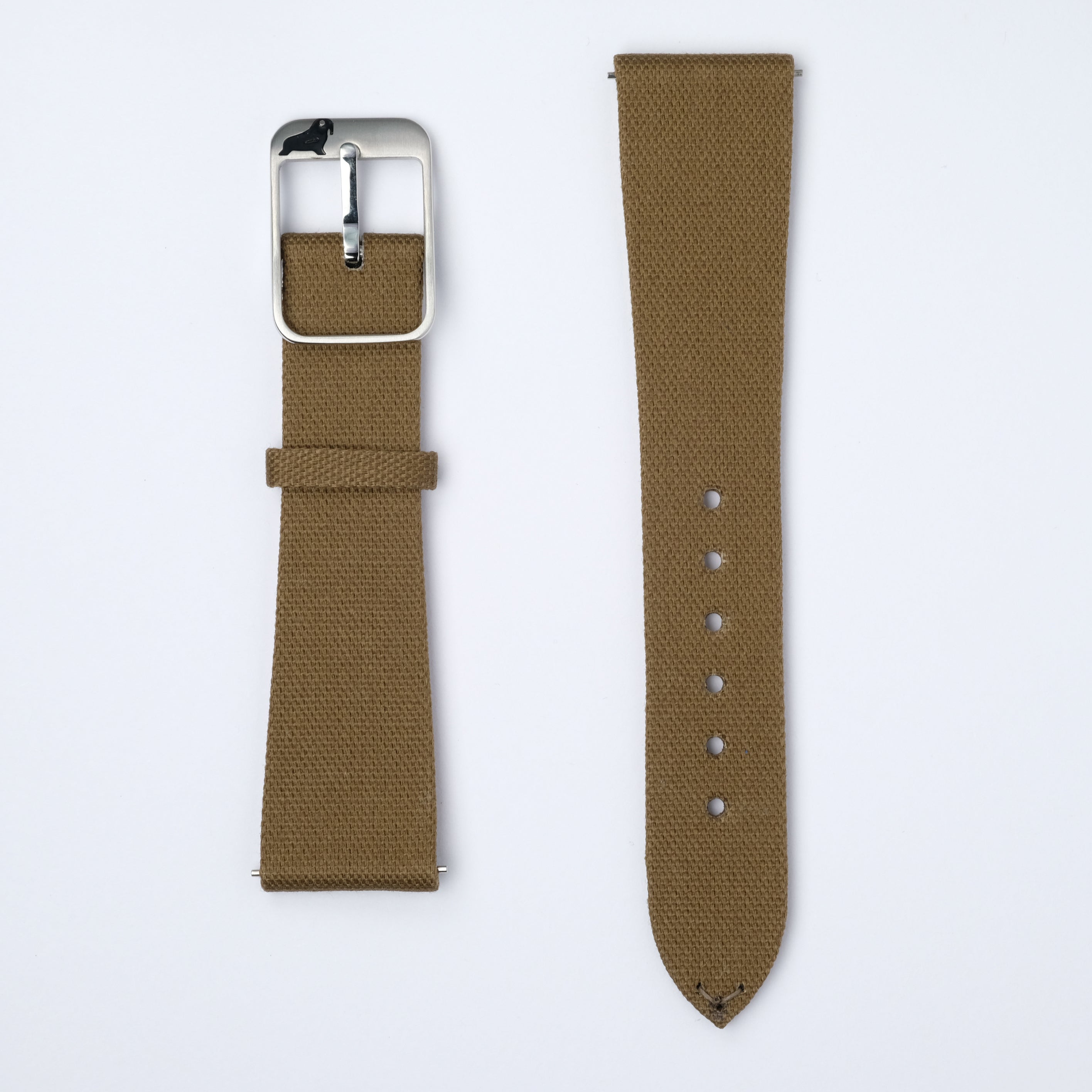 Two brown watch straps on a white background: Left, RSM's Pine Khaki Fine Canvas with silver buckle; right, Zermatt leather with adjustable holes.
