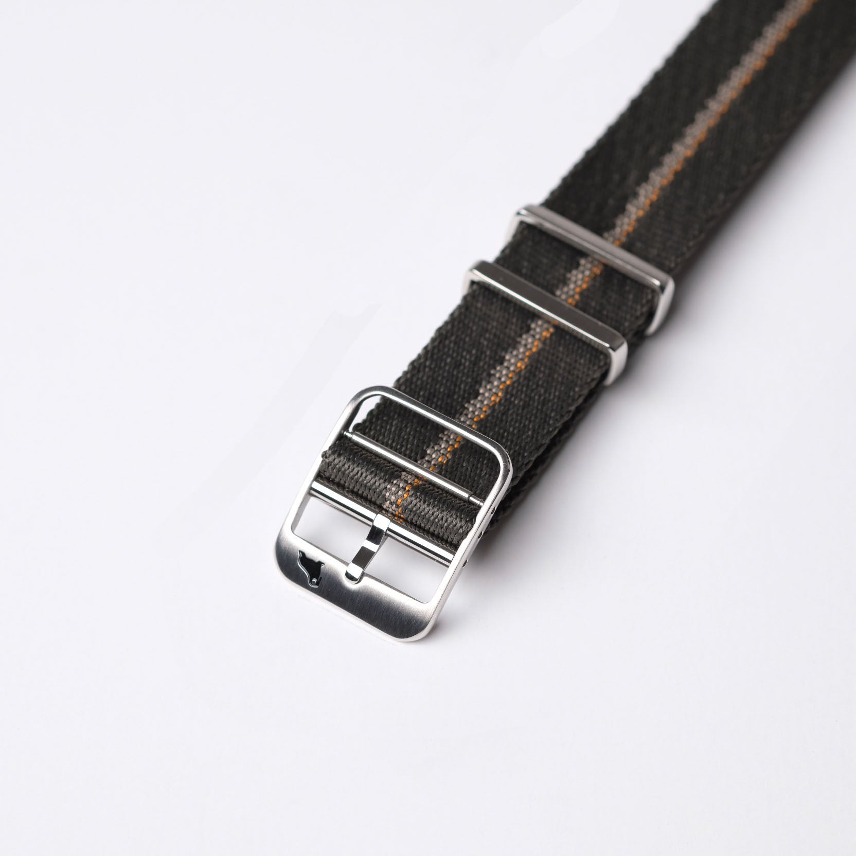 Engraved Stripe watch strap in Green, Beige, and Orange by RSM Watch Strap, with jacquard weave and 316L stainless steel buckle.