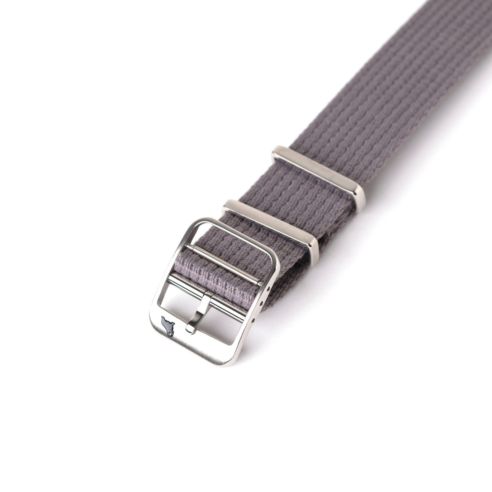 The VTG Mil in Grey by RSM Watch Strap features a gray woven design, stainless steel buckle, and two adjustable metal loops on a white background.
