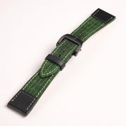The RSM Watch Strap Art Deco Silk Watch Strap in Green features black stitching, a black buckle, and black rectangular end pieces. Compatible with Apple Watch, it is shown on a plain white background.