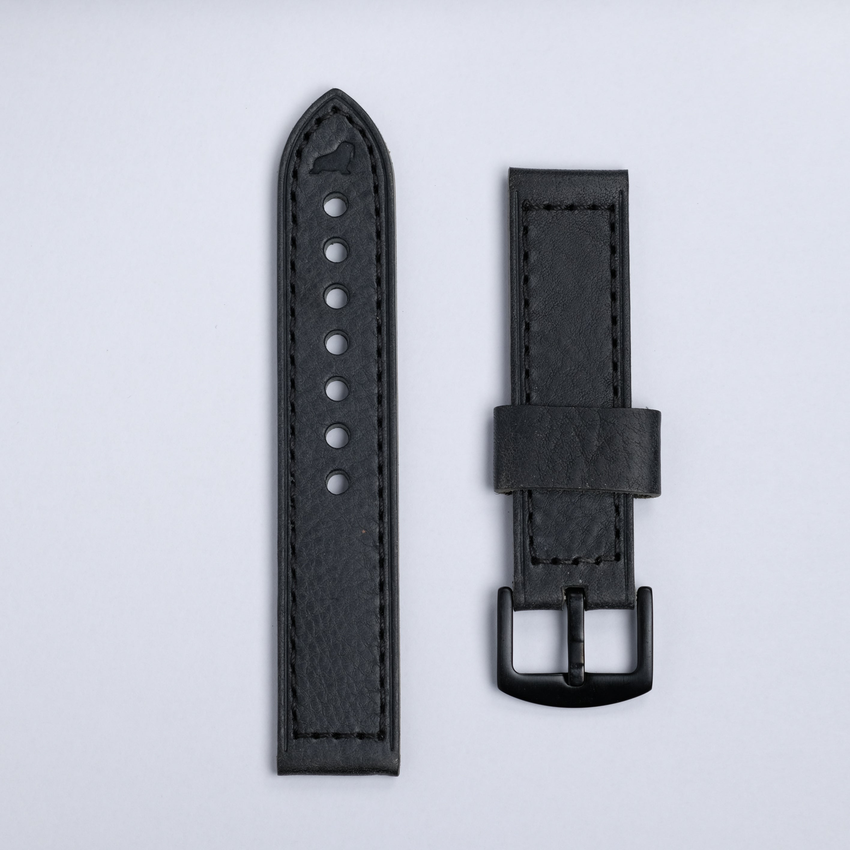 Two RSM Watch Strap “The Leather Watch Strap in Black” straps are shown side by side on a light gray background—one with adjustment holes, the other with a black metal buckle.