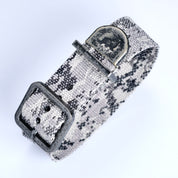 The RSM Watch Strap Snow Camo Zulu is a black and white polyester watch strap featuring a durable monochrome camouflage design.