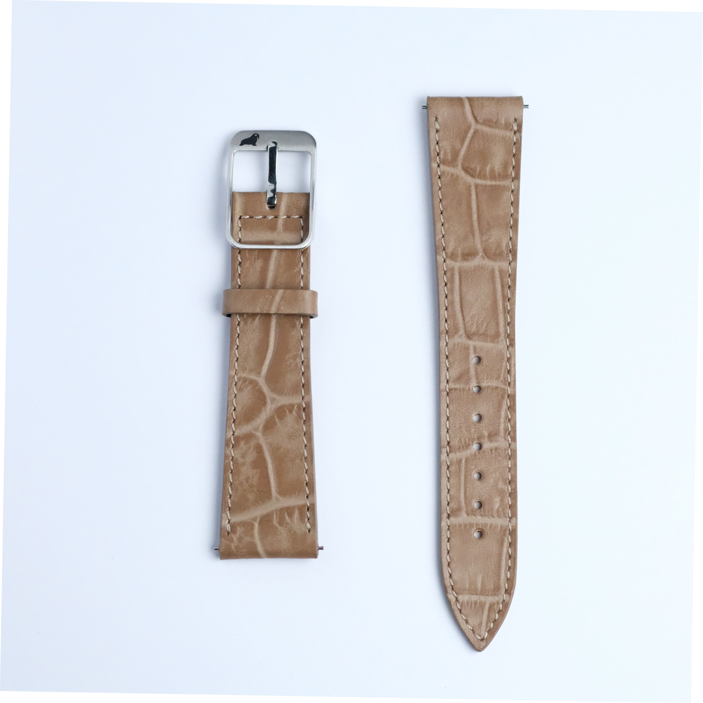 Two pieces of the RSM Watch Strap Alligator Grain Calf Leather Watch Strap in Taupe are shown on a white background: the left piece has a silver buckle, and the right features adjustment holes, showcasing fine Japanese craftsmanship.