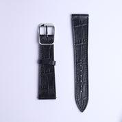 Two RSM Watch Strap Alligator Grain Calf Leather Watch Straps in Black are side by side on a white background—the left with a silver buckle, the right showing multiple adjustment holes.