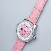 The Curved Lugs Alligator Circular Grain Watch Strap in Pink by RSM Watch Strap is crafted from embossed alligator leather, offering luxury for your watch with a refined pink finish designed to enhance any timepiece.