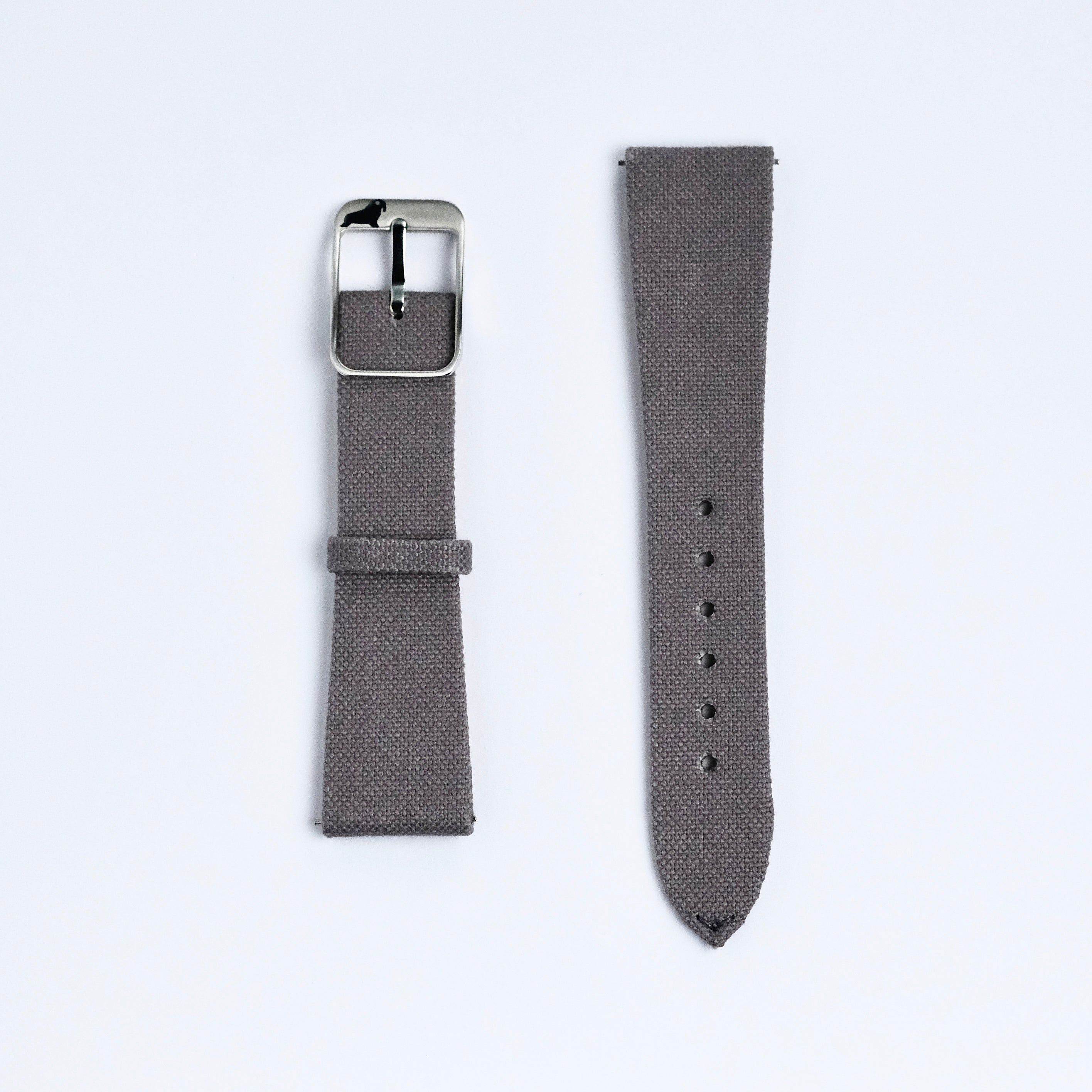 Two RSM Watch Strap Fine Canvas Watch Straps in Mid Grey are shown on a white background; the left one displays a silver buckle, while the right features multiple adjustment holes.