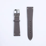 Two Fine Canvas Watch Strap pieces in Mid Grey by RSM Watch Strap are shown side by side on a white background—one with a silver buckle, the other with multiple adjustment holes and both featuring white stitching.