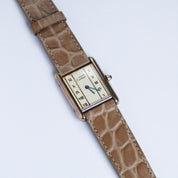 A taupe Alligator Circular Grain Calf Leather Watch Strap by RSM Watch Strap is displayed on a white background.