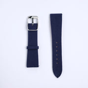 Two RSM Watch Strap Fine Canvas Watch Straps in Navy Blue lie on a white background; the left has a silver buckle, and the right has adjustment holes. Both feature quick release spring bars for easy, tool-free changes.