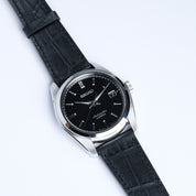 The RSM Watch Strap Alligator Grain Calf Leather Watch Strap in Black is displayed on a white background, featuring a refined texture that highlights the brand’s commitment to craftsmanship.