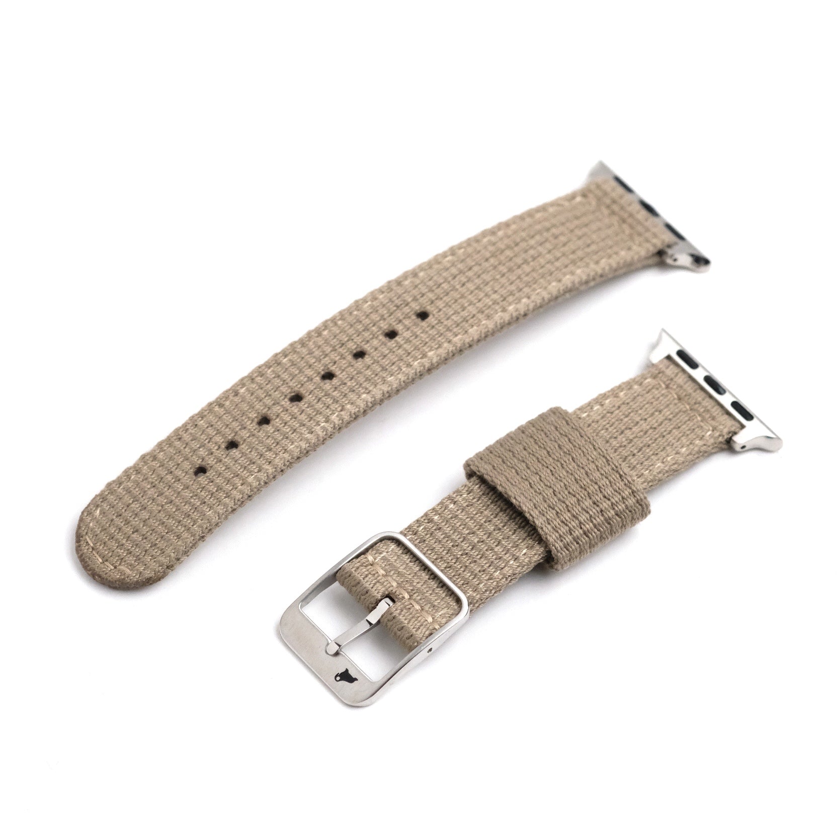 The RSM Watch Strap Vintage Military 2-Piece Watch Strap in Steel is a beige fabric band with metal connectors and a silver buckle, compatible with Apple Watch and featuring a quick-release design for easy attachment.