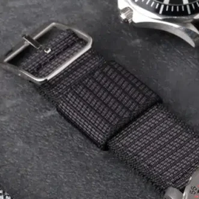 X-Hatch RSM Watch Strap in black with detailed texture and silver hardware, offering a sleek, durable, and stylish fit.
