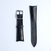 Two RSM Watch Strap Curved Lugs Alligator Rectangular Grain Watch Straps in Black are displayed side by side on a white background—one with a silver buckle, the other with adjustment holes, both highlighting Japanese craftsmanship.