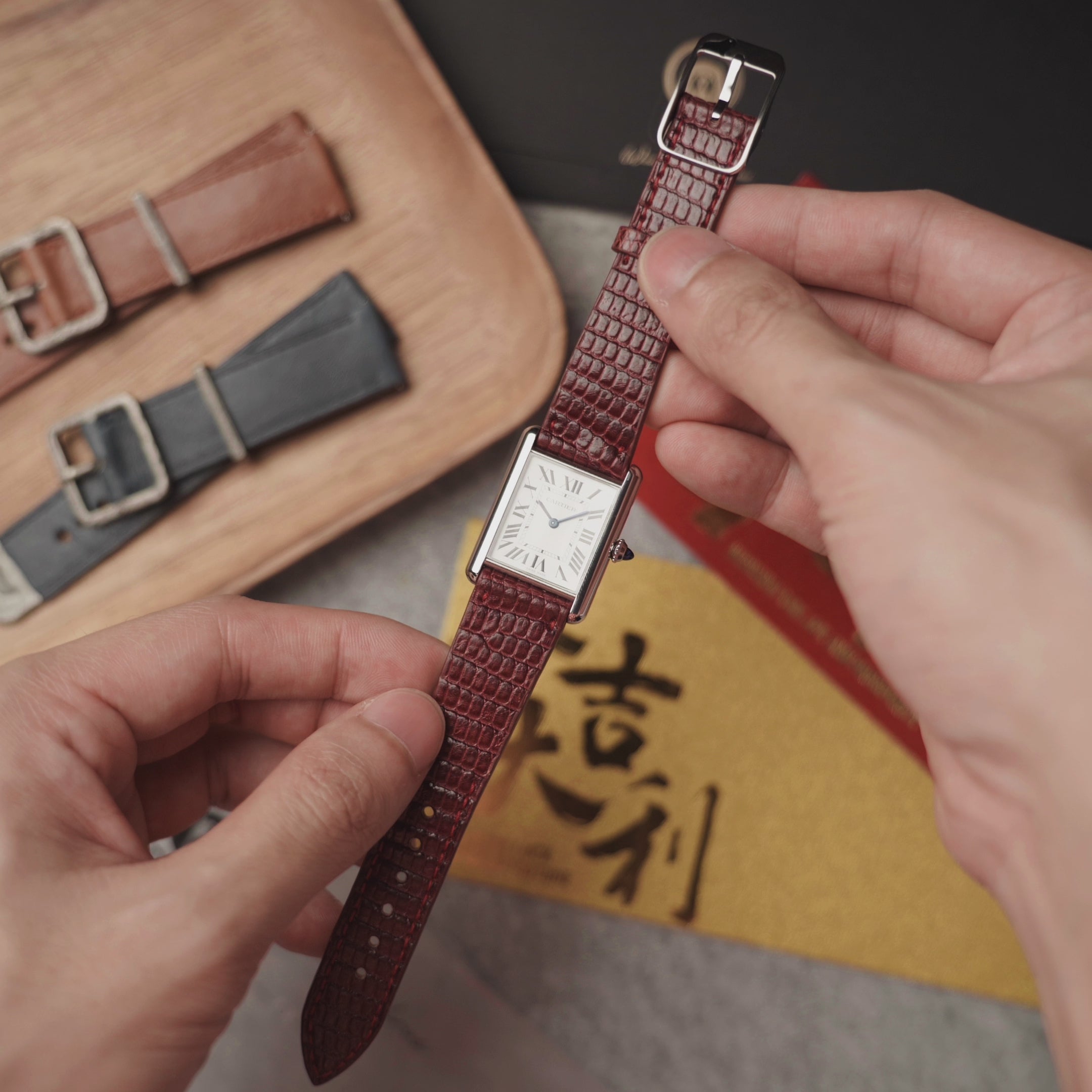 Red Lizard Leather Watch Strap by RSM paired with a Cartier Tank