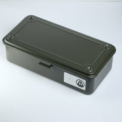 A closed, rectangular, dark green metal box with a latch on the front and a small sticker featuring icons on the side sits on a plain white surface—a perfect RSM Watch Strap Watch Tool Box T-190, ideal for watch tool or watch strap storage.