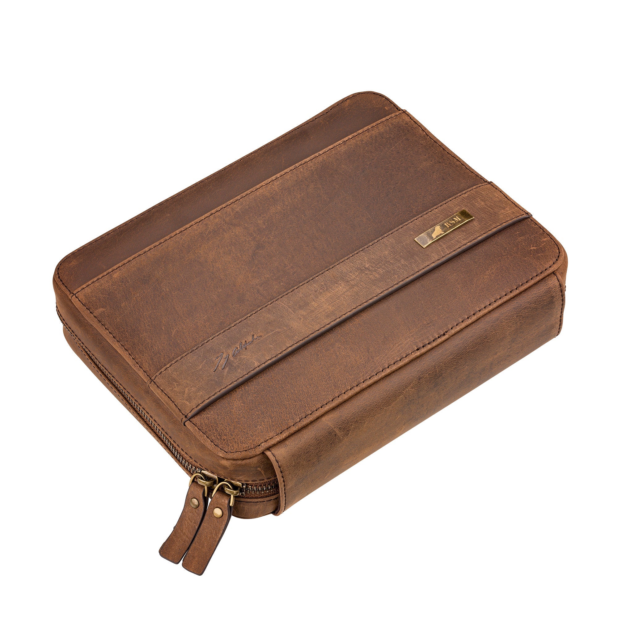 The 3-Piece Travel Watch Case in Brown Leather by RSM features a rustic Crazy Horse Leather finish, two zipper pulls, and a small metal label with a signature.
