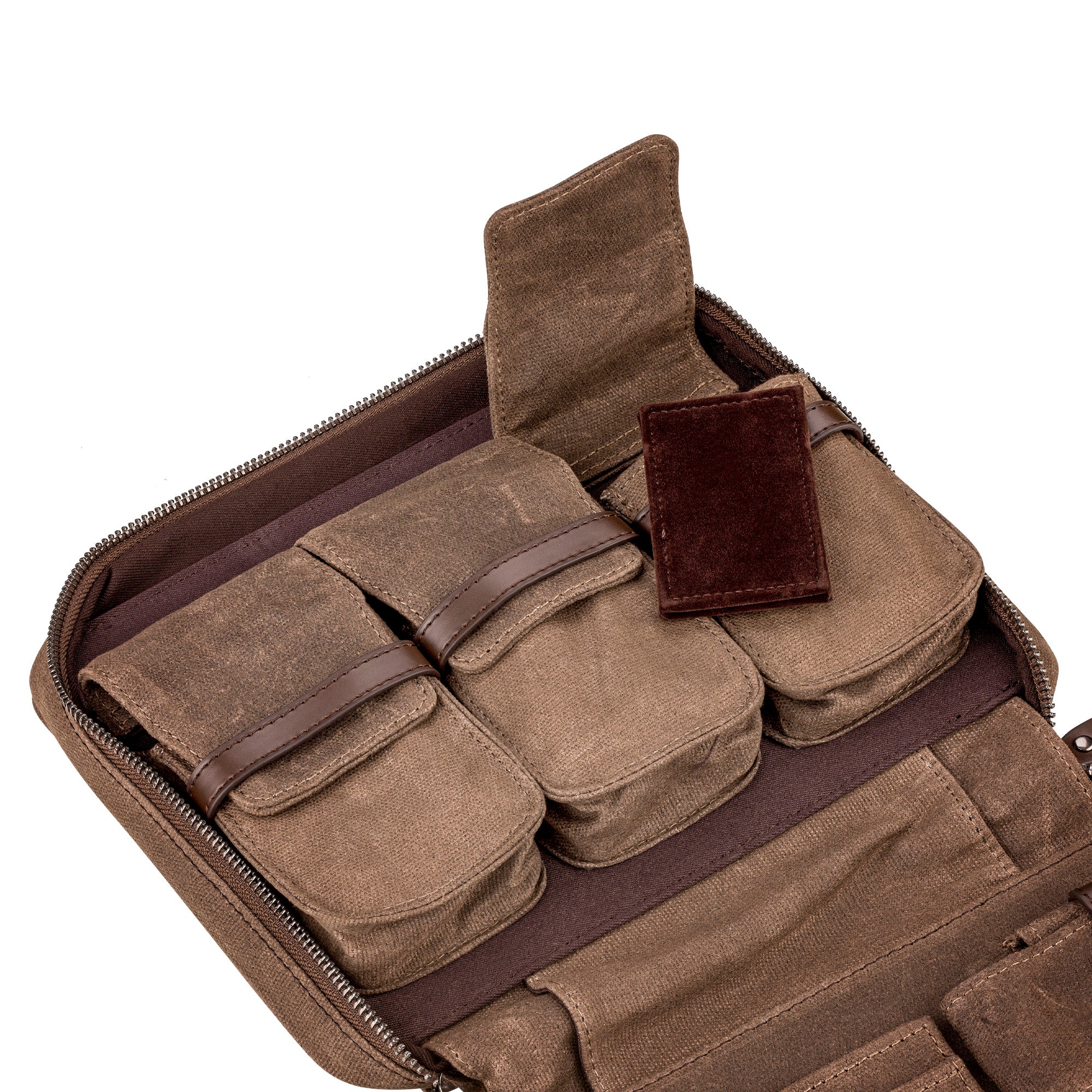 3-Piece Travel Watch Case in waxed canvas with three pouch pockets, leather straps, and a dark fabric interior, perfect for travel storage.