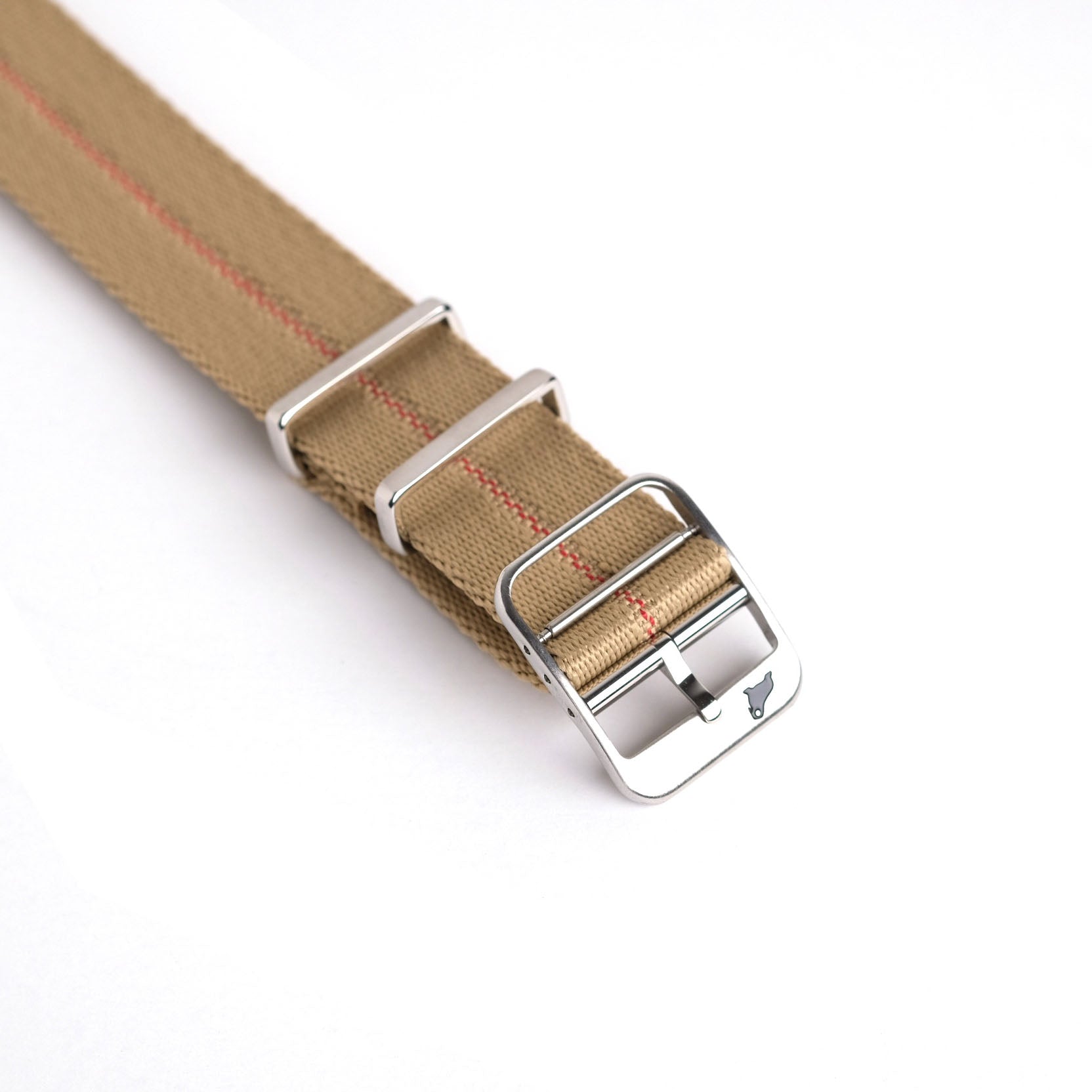 The Red Cross Stripe Engraved RSM Watch Strap with silver hardware is showcased against a clean white background.